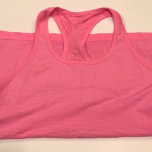 Cute pink swiftly tank. No flaws or pilling!